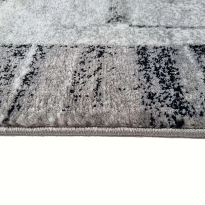 Stück Teppich 200x290 cm DEMIAN mit Patchworkmuster - grau/weiß