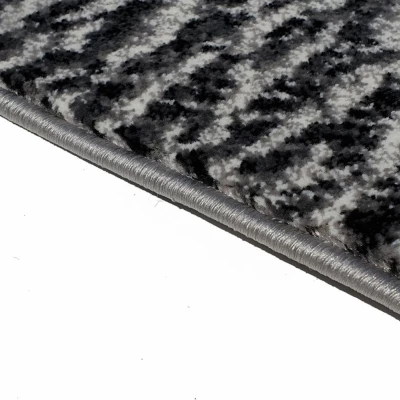 Abstrakter Stückteppich 200x290 cm DEMIAN - grau/weiß