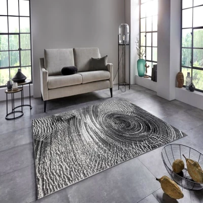 Abstrakter Stückteppich 140x190 cm DEMIAN - grau/weiß