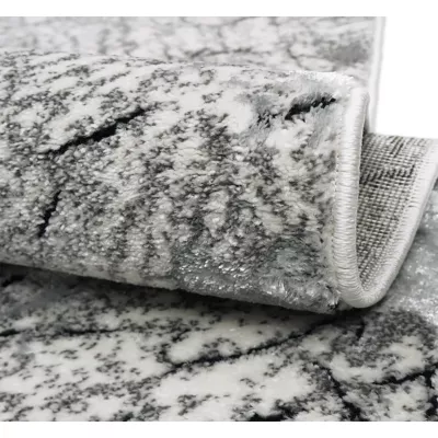 Stück Teppich mit abstraktem Muster 60x100 BRAWLEY 1 - grau / weiß