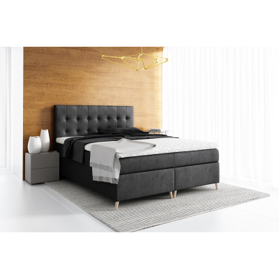 Elegantes gepolstertes Einzelbett mit Aufbewahrung Komala schwarz 120 x 200 + Gratis-Topper